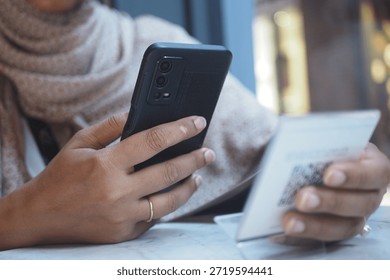 Using a smartphone to scan a code at a cafe