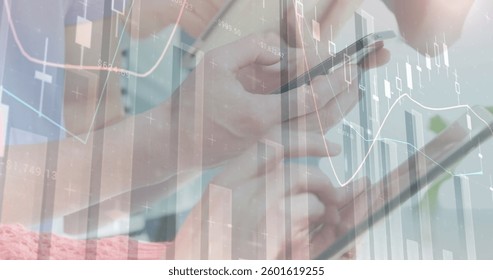 Using smartphone and tablet, professionals analyzing digital financial data charts. Technology, business, collaboration, finance, analytics, graphs
