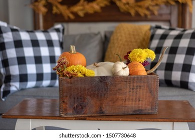 Using A Vintage Wooden Crate To Hold Colorful Autumn Flowers And Pumpkins - Fall Decorations For The Home