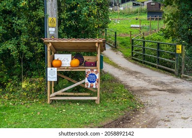 Usk, Monmouthshire Wales UK October 14 2021 Unmanned Farm Shop Counter Selling Eggs And Seasonal Halloween Pumkins With Honesty Box