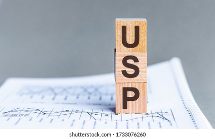 USP - Unique Selling Proposition word concept on cubes - Shutterstock ID 1733076260