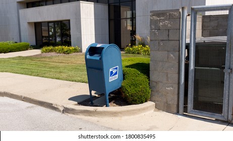 USPS Mailbox On A Sidewalk