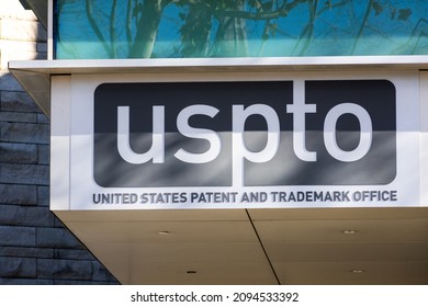USPTO sign on the facade of United States Patent and Trademark Office location - San Jose, California, USA - 2021
