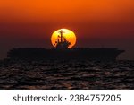 USS George H.W. Bush (CVN-77) USA navy nuclear aircraft carrier at sunset anchored in the Mediterranean sea while visiting Haifa port, Israel for rest and recreation on 4th of July 2017
