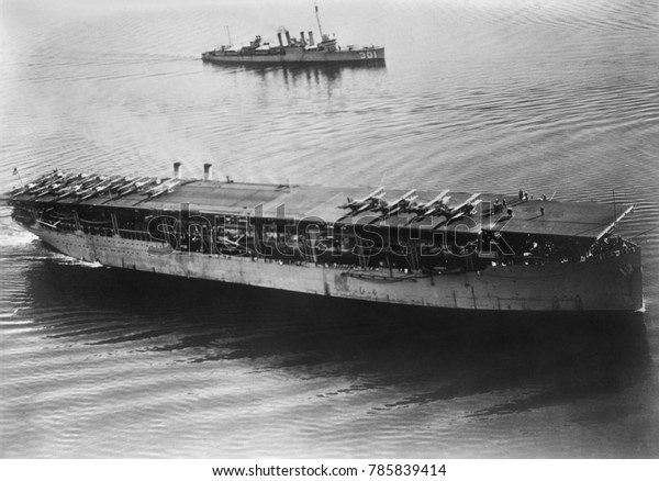 USS Langley, the United States Navy\'s first\
aircraft carrier, was commissioned on March 20, 1922. On her deck\
two \'firsts\' occurred: the first plane was catapulted from a\
carrier; and the first\
plane