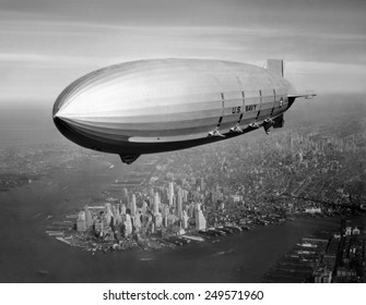 USS Macon, sister ship of USS Akron, over New York Harbor, ca. 1933. USS Macon, participated in Naval operations until crashing in a storm off Point Sur, California, on Feb. 12, 1935.