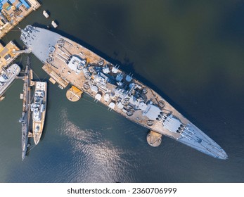 USS Massachusetts B-59 Battleship aerial view at Battleship Cove on Taunton River in city of Fall Rivers, Massachusetts MA, USA.
