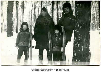 USSR - CIRCA 1960s: Family When Skiing On A Background Of Pine Forest, Kharkiv Oblast, Ukraine, 1960s The Boy's Name Andrew And Serge 6 And 4 Years