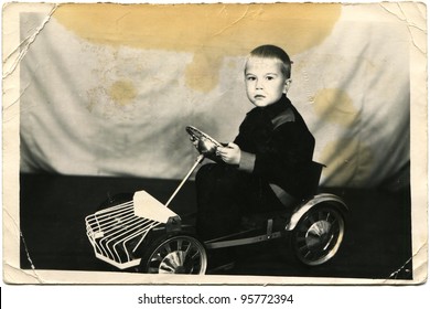 USSR - CIRCA 1960s: The Little Boy On The Pedal Car, Circa 1960s