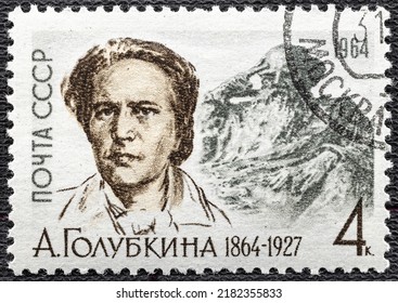 USSR - CIRCA 1964: A Stamp Printed In USSR Issued For The Birth Centenary Of Anna Semyonovna Golubkina Shows Sculptor Golubkina And Tolstoy Statue.