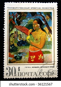 USSR - CIRCA 1970: A stamp printed in the USSR shows a painting by the artist Paul Gauguin "The woman holding a fruit", circa 1970.