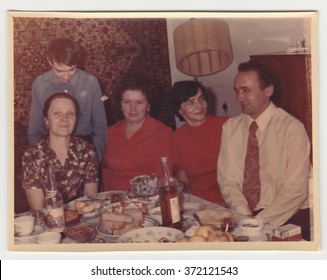 USSR - CIRCA 1970s: Vintage Photo Shows Family During Feast.