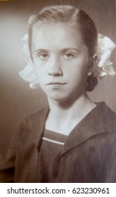 USSR, LENINGRAD - CIRCA 1960: Vintage photo of young school girl portrait in Leningrad, USSR