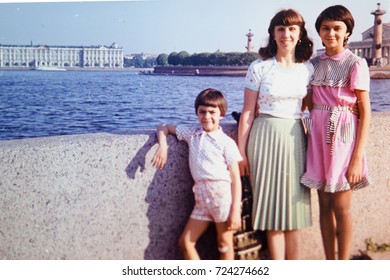 USSR, LENINGRAD - CIRCA 1981: Vintage Photo Of Mom With Kids At Walk On Neva River Embankment