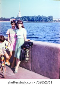 USSR, LENINGRAD - CIRCA 1981: Vintage Photo Of Mom With Kids On Neva River Embankment In Leningrad, USSR