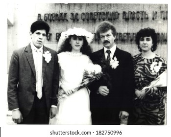 USSR, Petrapavlovsk  - CIRCA 1980s: An antique photo shows Group wedding portrait