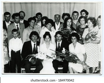 USSR, Petrapavlovsk - CIRCA 1980s: An Antique Photo Shows Group Wedding Portrait