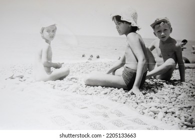 USSR, SOCHI - CIRCA 1979: Vintage Family Photo Of Children On The Black Sea Beach