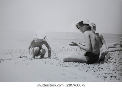 USSR, SOCHI - CIRCA 1979: Vintage Family Photo Of Children On The Black Sea Beach