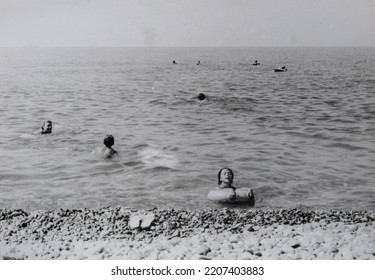 USSR, SOCHI - CIRCA 1979: Vintage Family Photo Of Family Vacation On The Black Sea Beach