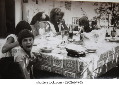 USSR, SOCHI - CIRCA 1981: Vintage Photo Of Family Friends Lunch