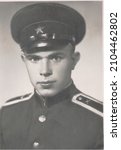 USSR, Ulyanovsk - 1956: Studio portrait of a soldier of the Soviet red army. Transferred property, family archive. Outdated quality.
Vintage black and white paper photo