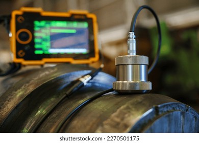 UT, Ultrasonic test to detect imperfection or defect in steel roller in the factory, NDT Inspection. - Shutterstock ID 2270501175