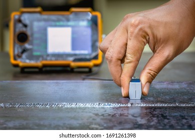 UT, Ultrasonic testing to detect imperfection or defect in welding of steel structure. NDT Inspection. - Shutterstock ID 1691261398