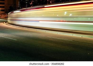 UTA Trax Train In Motion At Night