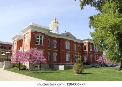 The Utah Cache County Visitors Center With Flowering Trees