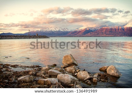 Utah lake with Timpanogos mountains in the background, taken in Saratoga Springs Utah at sunset