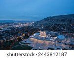 Utah State Capitol seen from above, night image with city in the background, Salt lake City, UT, US