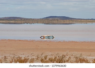 Ute Bogged In Mud On A Salt Lake Australia.
The Last Rites For A Ute Eaten Away By Salt.