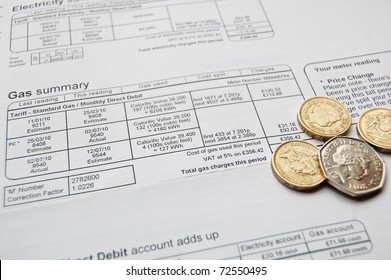 Utility Bill And Coins For Payment