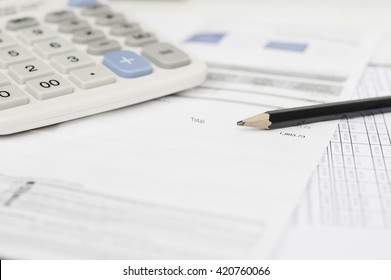 Utility Energy Bill And Calculator With Pencil, Bill And Saving Concept