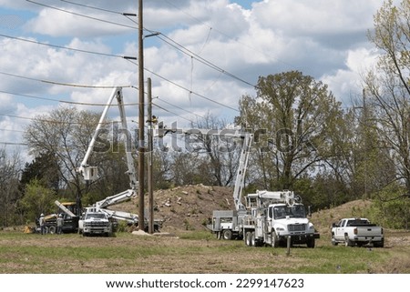Utility Pole Section Being Loaded on Truck Bed