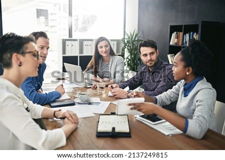 Utilizing the knowledge, experience and skills of everyone involved. Shot of a group of businesspeople having a meeting.