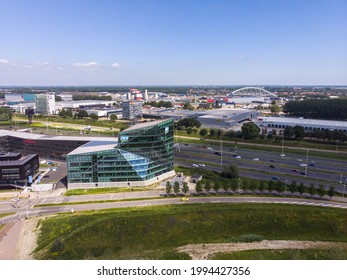 UTRECH, NETHERLANDS - Jun 13, 2021: Contemporary Modern Glass Window Exterior Facade Of The Dutch Trade Union Workers Association In Utrecht Next To Highway 