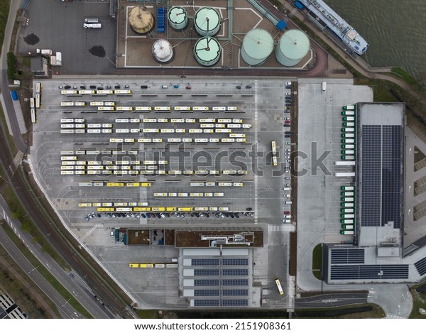 Utrecht bus\
garage terminal hub storage and maintenance facility passenger\
transportation station. Aerial drone\
view.