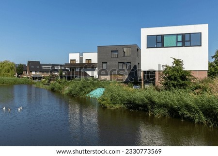 Utrecht, the Netherlands. 08 July 2023. New build homes with water infront. vinex district Leidsche Rijn Utrecht.  New district with modern architecture.
