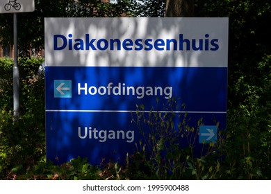 Utrecht, The Netherlands - June 14, 2021: Street Sign In Front Of The Diakonessenhuis Hospital Front Access And Entrance. TRANSLATION: 'HOSPITAL. MAIN ENTRANCE. EXIT'