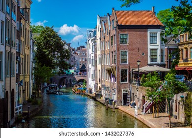 Utrecht, Netherlands - June 18, 2019: Traditional houses on the Oudegracht canal (Old Canal) in Utrecht, Netherlands. 