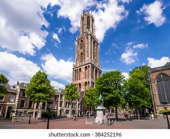 Utrecht, the Netherlands, June 29, 2015: View of the gothic church tower, 'Dom' from the Domplein in the medieval city center on a summer day
