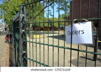 Utrecht, The Netherlands - May 26 2020: An Elementary School Has Put Up A Sign 'parents' At The School Gate. Parents Are Not Allowed On The Schoolyard And Have To Wait For Their Childeren Outside.