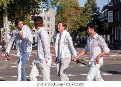 Utrecht, NL - OCT 9, 2021: Group Of Young Students Dressed In White Gathered For A Social Occasion In Utrecht City, Netherlands.