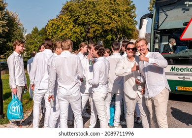 Utrecht, NL - OCT 9, 2021: Group Of Young Students Dressed In White Gathered For A Social Occasion In Utrecht City, Netherlands.