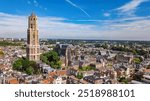 Utrecht town аerial drone view from above, typical Dutch city skyline, Utrecht cityscape with tower, canals and houses, Holland, Netherlands