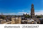 Utrecht town аerial drone view from above, typical Dutch city skyline, Utrecht cityscape with tower, canals and houses, Holland, Netherlands