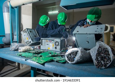 Uttarakhand, India, January 29 2021 : workers dismantling Old PCs or CPU at  Electronic waste recycling plant at haridwar,