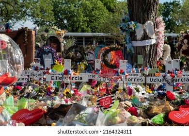 Uvalde, TexasUnited States - June 5, 2022: Texans visit the memorial at Robb elementary school dedicated to the victims of the May shooting in Uvalde, Texas. 